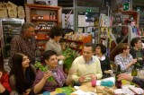 Fotoracconto della cenabaratto con Franca Molinaro, sulle erbe, e La Vigna, sui vini solidali